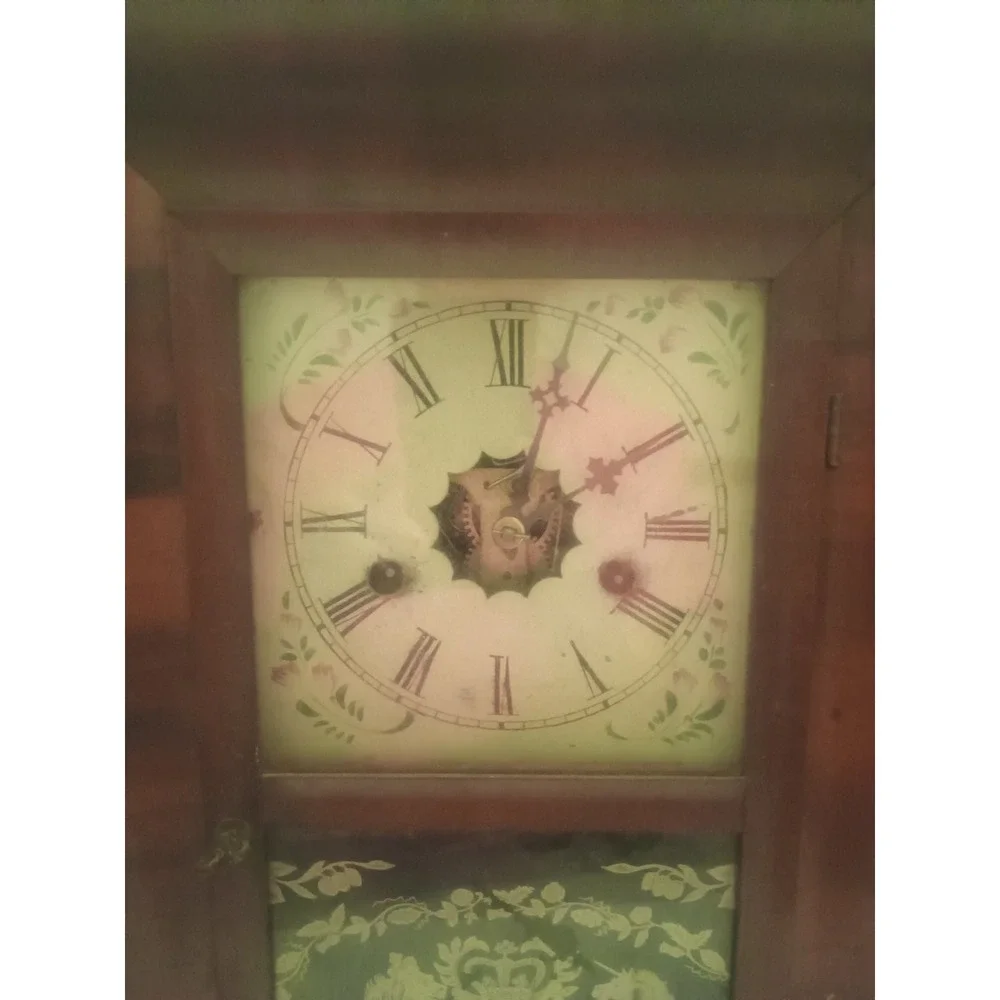 antique wall clock working